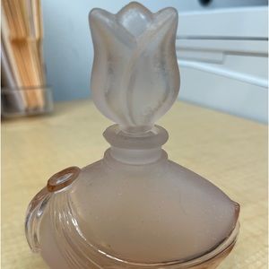 Vintage light pink perfume bottle